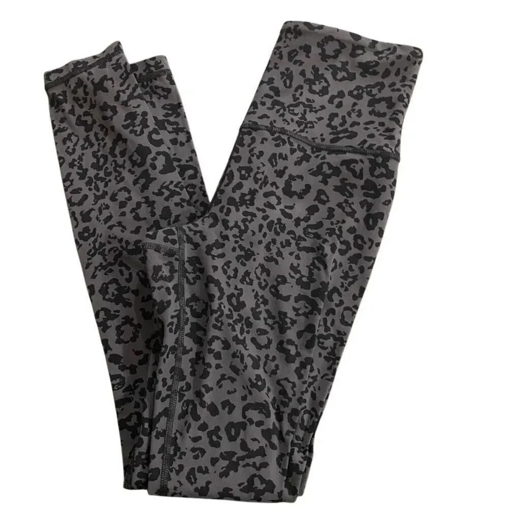 Athleta Elation Ultra High Rise Tight leopard prints size XS